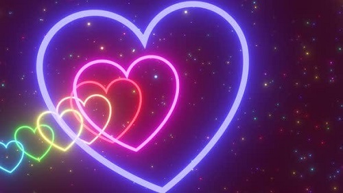 Videohive - Flying Through Curved Love Heart Tunnel Shapes Glow Rainbow Sparkles - 4K - 36698559