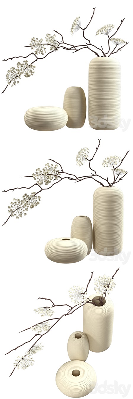 Bouquet of flowering branches in ceramic vases