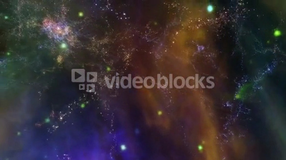 Moving through colorful nebula in space