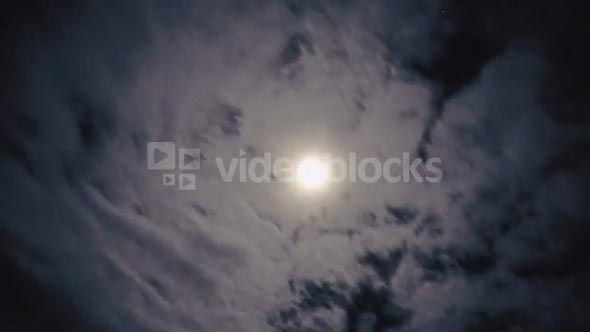 Time Lapse night clouds with moon