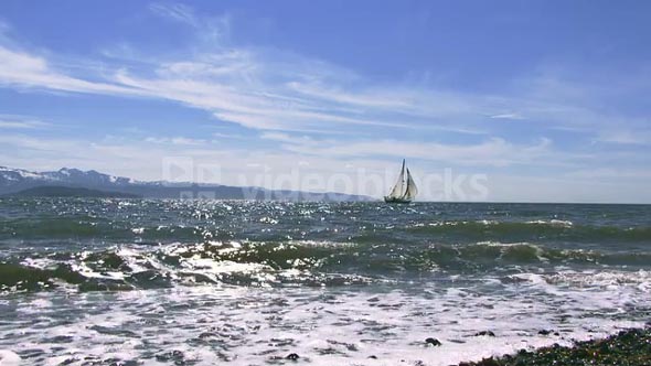 Zoom Out Sailing Ship Off Beach Coast