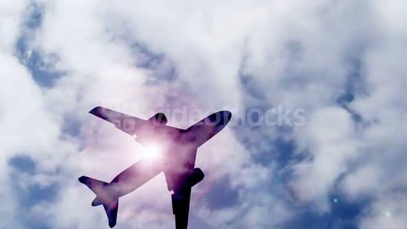 Airplane Cuts Through Clouds