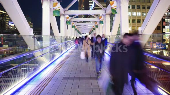 T/L People crossing a pedestrain bridge, Shinjuku, Tokyo, Honshu, Japan