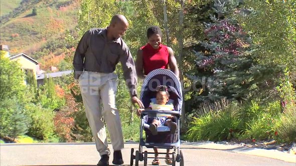 Parents on a Walk with their Daughter 9