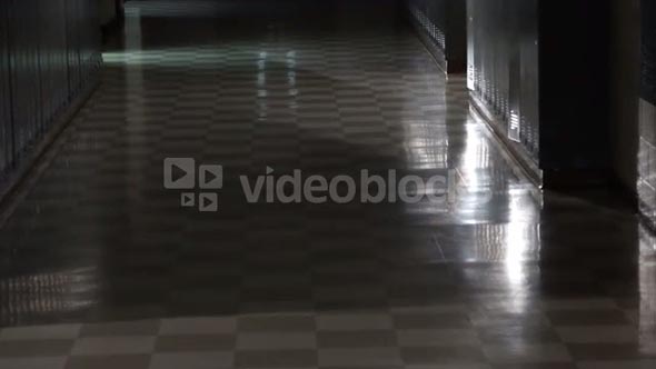 Rack Focus Of Checkered School Hallway