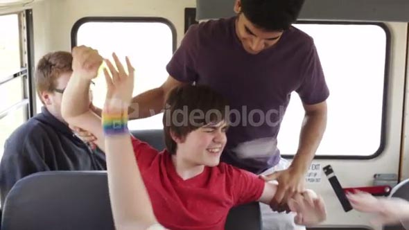Kids Bully Student on Bus