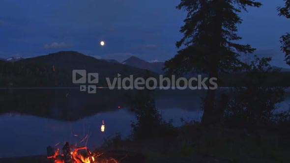 Campfire By Mountainside Lake
