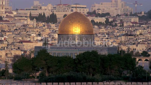 Golden Dome With City In Background