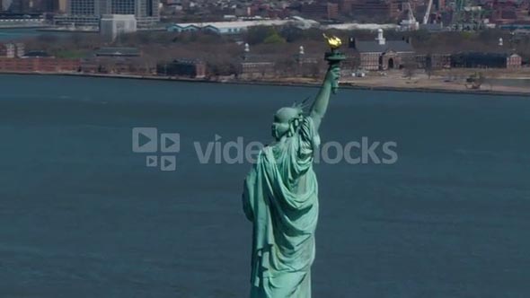 Sweeping Aerial Statue of Liberty's Torch