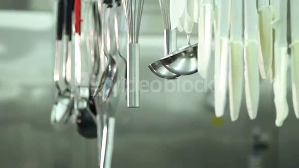 Hands Hanging Professional Cooking Tools