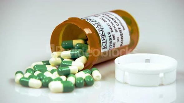 Green and White Pills in Prescription Bottle 3
