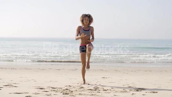 Young Sport Woman On The Beach