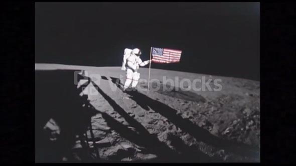 Astronaut Next to American Flag