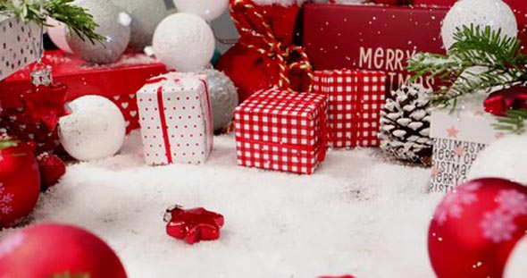 Background video with Christmas ornaments and gift box and snow