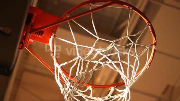 Rack Focus Of Basketball Hoop From Below