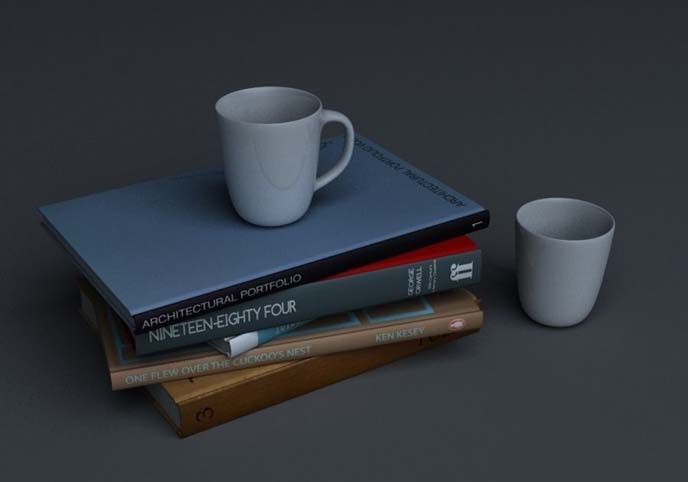 Stack of books and two mugs