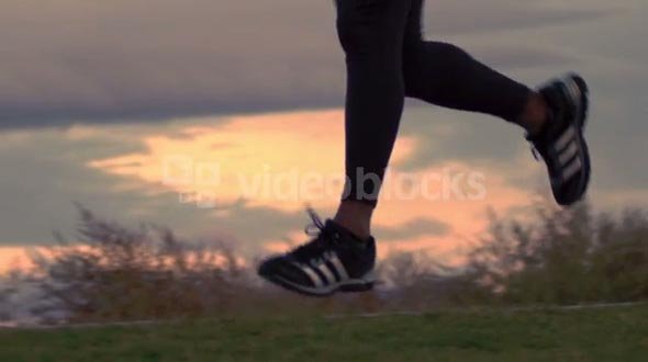 Closeup of Running Mans Feet in Slow Motion